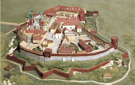 Ilustracja przedstawiająca średniowieczny Kraków i płonące wzgórze wawelskie
