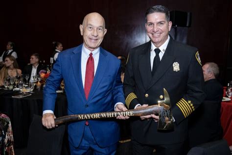 Thematic photo of an OSP firefighter in a gala uniform with a black tie