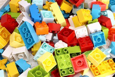 Graphic showing LEGO DUPLO bricks undergoing various safety tests