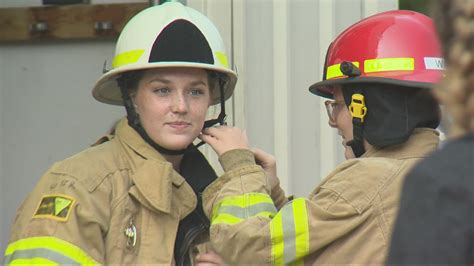 Women from KGW serving refreshments to firefighters during a break