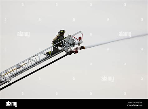 Side view of LENA GIGANT fire truck, highlighting the ladder and water cannon