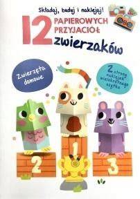 Dzieci wycinające i sklejające papierowe figurki