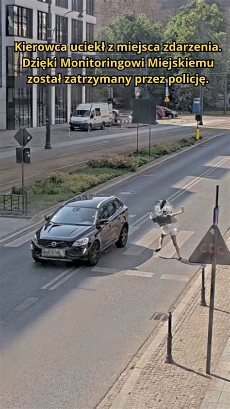 piesza rozmawiająca przez telefon i ignorująca karetkę