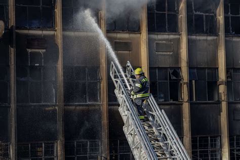 Thematic photo of firefighters at a building fire