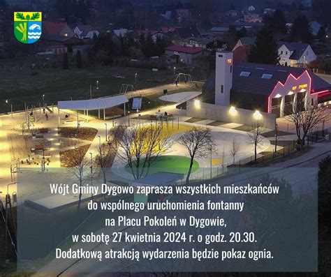 Zdjęcie nowoczesnej remizy strażackiej w Dygowie z Placu Pokoleń z widoczną siłownią zewnętrzną i placem zabaw