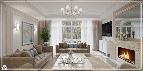 Zdjęcie aranżacji salonu z kamiennym kominkiem i roślinnością