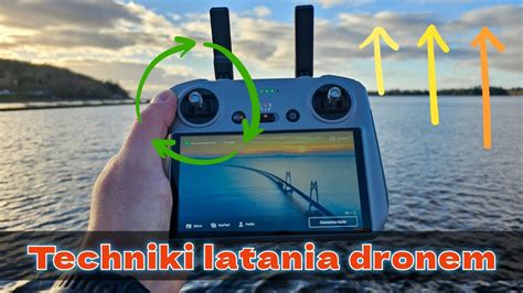 Dron wykonujący rozpoznanie nad rzeką w celu monitorowania poziomu wody.
