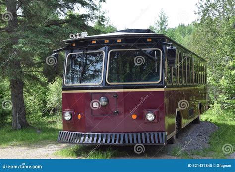 Thematic photo of a bus fire in a rural setting, possibly Bieszczady-like landscape