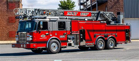 Thematic photo of a modern fire truck with a raised ladder