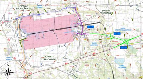 Mapa strategicznych dróg i infrastruktury wokół Tuszyna, pokazująca lokalizację i zasięg ochrony.