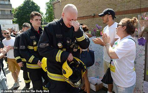 Emotional photo of firefighters paying tribute