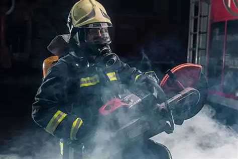 Thematic photo of a firefighter using a saw during a rescue operation