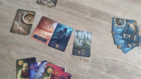 Tematyczne zdjęcie gry planszowej Inferno z kręgami piekielnymi i duszami