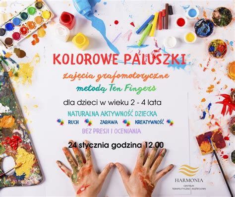 Dzieci malują ogień palcami na czarnym papierze