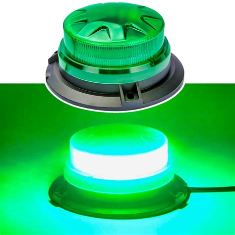 Photo of a green flashing light mounted in a private car window