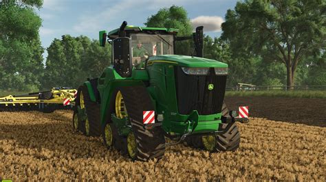 Zrzut ekranu prezentujący różnorodne modyfikacje pojazdów i maszyn w Farming Simulator 2011