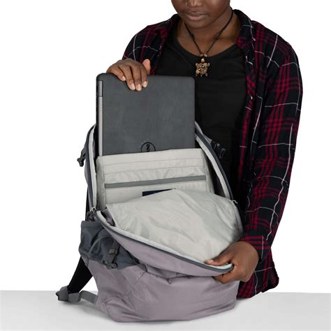 Close-up photo of the AirScape back panel and ergonomic shoulder straps of the Osprey Axis 24 backpack