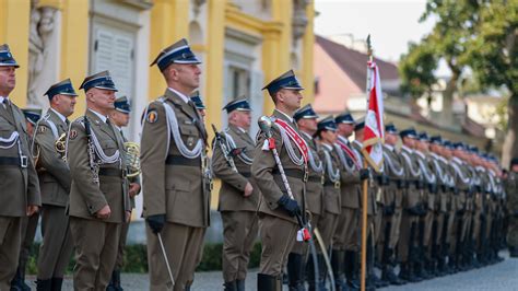 Thematic photo of an OSP board member wearing a formal uniform with a rogatywka cap