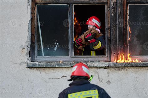 Photo of a burning car in Rybnik with a child rescue operation.