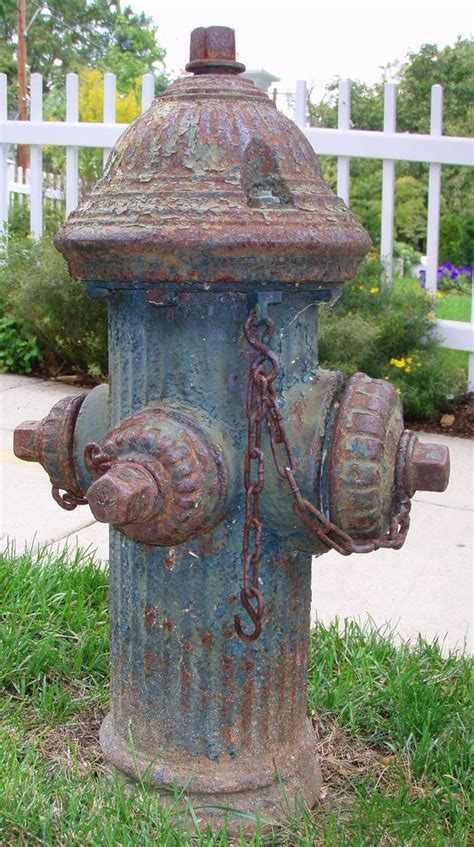 Photo of a historical-style fire hydrant in an old town