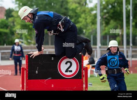 Firefighters performing a relay race
