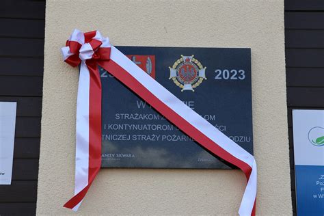 Tablica pamiątkowa z okazji 130-lecia OSP Tuchów