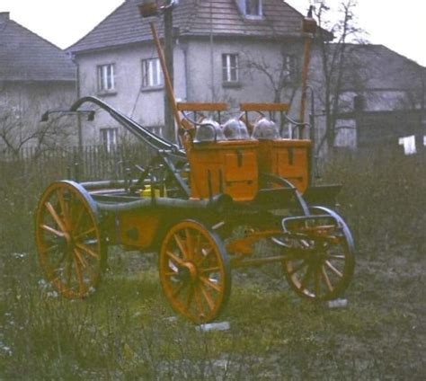 historyczna fotografia strażaków OSP Modlnica lub konny wóz strażacki
