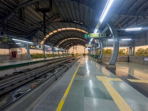 Photo of a metro station platform during an evacuation or a metro train being examined after a fire.