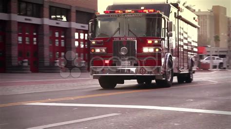 Thematic photo of a modern fire truck with flashing lights